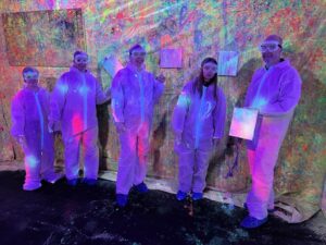 Five people doused in paint at the splatter room inside All Out Smash in Denver, CO